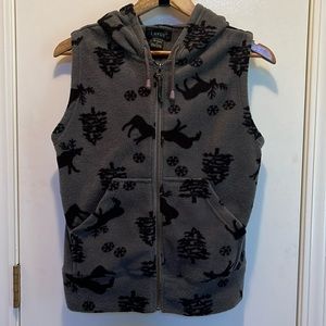 Hooded, fleece vest. Pocket front. Great condition.